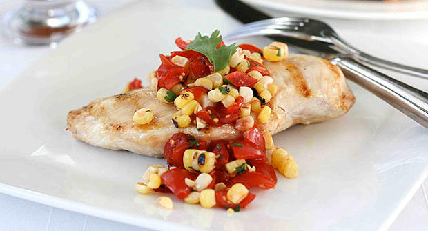 Grilled chicken with smoky corn and tomato salsa by food blogger Dara Michalski, the "Cookin' Canuck." 