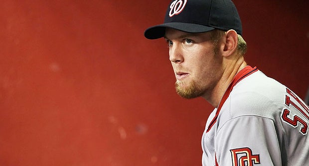 Pitcher Stephen Strasburg #37 of the Washington Nationals sits in the dugout during the Major League Baseball game against the Arizona Diamondbacks at Chase Field on August 4, 2010 in Phoenix, Arizona.