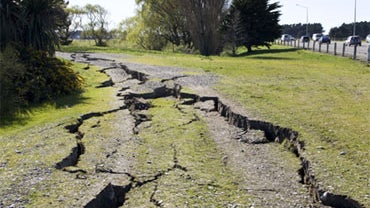 Cracks are seen in the earth after a 7.1 magnitude earthquake struck 30km west of the city at 4:35 am this morning September 4, 2010 in Christchurch, New Zealand. 