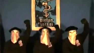 Three members of the Basque separatist militant movement ETA in a video provided to BBC News. 