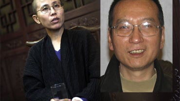 Liu Xia, left, the wife of jailed Chinese dissident and 2010 Nobel Peace Prize winner Liu Xiaobo, during an interview in Beijing, Sept. 29, 2010. The two were able to meet as the Nobel laureate told his wife to dedicate the award to victims of the 1989 Ti 