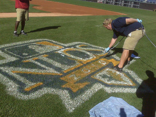 Phillies' ground crew paints NLCS logo on field of Citizens Bank Park 