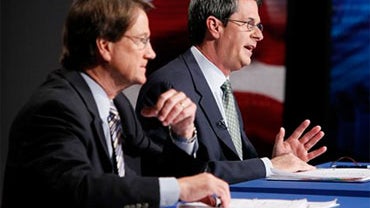 Incumbent Sen. David Vitter, R-La., right, and Louisiana senatorial candidate, Rep. Charlie Melancon, D-La., prepare for the start of their debate at the WWL television studios in New Orleans, Thursday, Oct. 28, 2010. (AP Photo/Patrick Semansky 