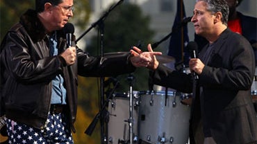 Comedians Steven Colbert and Jon Stewart perform at the Rally to Restore Sanity and/or Fear on the National Mall on October 30, 2010 in Washington, D.C. 