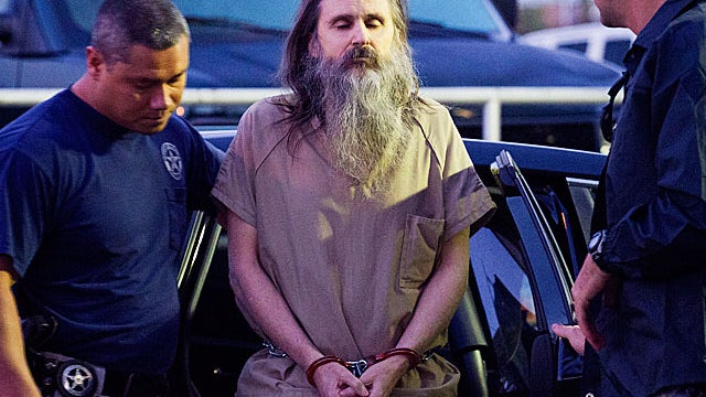 Brian David Mitchell is escorted into the Frank E. Moss Federal Courthouse Monday, Nov. 1, 2010, in Salt Lake City. 