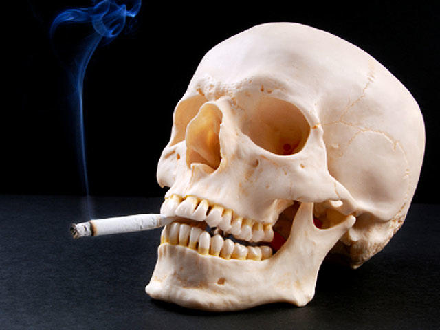 Why does smoking make your lungs go black?