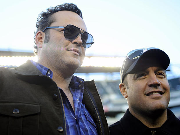 Actors Vince Vaughn, left, and Kevin James walk the sidelines during warmups before an NFL football game between the Philadelphia Eagles and the Indianapolis Colts, Sunday, Nov. 7, 2010 in Philadelphia. (AP Photo/Michael Perez) 