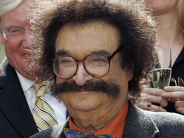 FILE - In this May 31, 2006 file photo, film critic Gene Shalit is seen during a toast with "Today" show cast and crew at the end of Katie Couric's final show, in New York. Shalit, 85, said Tuesday, Nov. 9, 2010 that he's leaving the "Today" show, where he's reviewed movies for 40 years. (AP Photo/Richard Drew, File) 