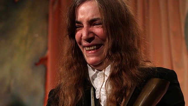 Patty Smith, winner of the National Book Award for Nonfiction for her book "Just Kids", poses with her award at the National Book Awards Wednesday Nov. 17, 2010 in New York. (AP Photo/Tina Fineberg)   -------------------------------------------- 