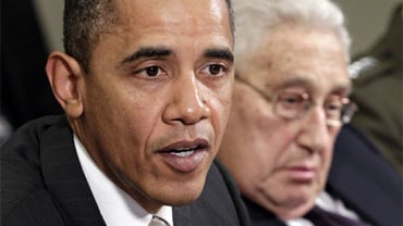President Barack Obama makes a statement on the ratification progress of the New START pact (Strategic Arms Reduction Treaty), Thursday, Nov. 18, 2010, in the Roosevelt Room at the White House in Washington. Former Secretary of State Henry Kissinger is at 