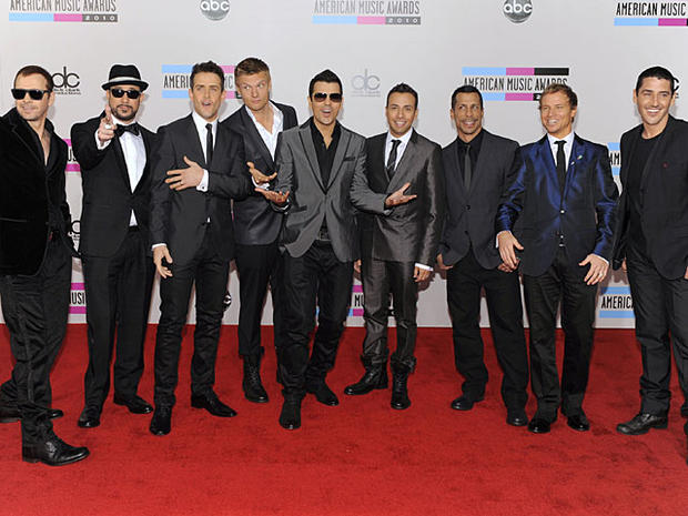 Members of Backstreet Boys and New Kids on the Block arrive at the 38th Annual American Music Awards on Sunday, Nov. 21, 2010 in Los Angeles. From left, are Donnie Wahlberg, A. J. McLean, Joey McIntyre, Nick Carter, Jordan Knight, Howie Dorough, Danny Woo 