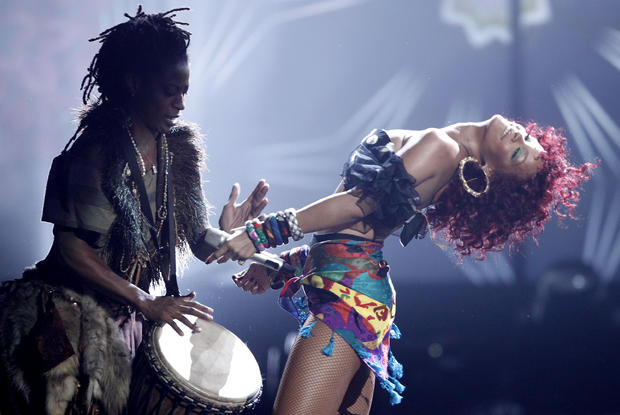 Rihanna, right, performs at the 38th Annual American Music Awards on Sunday, Nov. 21, 2010 in Los Angeles. (AP Photo/Matt Sayles 