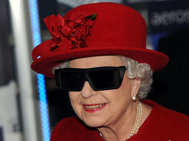 Britain's Queen Elizabeth II wears 3 D glasses to watch a display and control a mechanical digger during a visit to the University of Sheffield Advanced Manufacturing Research Centre. in Sheffield England Thursday Nov. 18, 2010. (AP Photo/John Giles/PA) U 