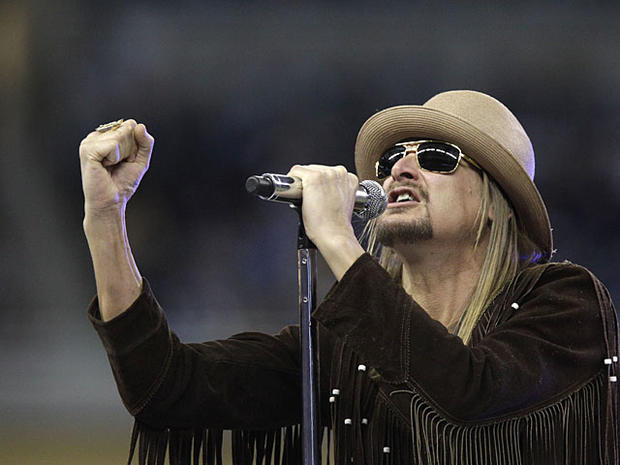 Musician Kid Rock performs during the half time ceremony at the NFL football game between thd Detroit Lions and the New England Patriots, Thursday, Nov. 25, 2010, at Ford Field in Detroit. (AP Photo/Carlos Osorio) 