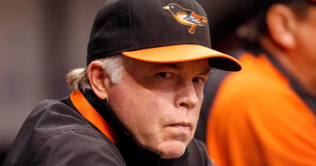 Baltimore Orioles manager, BUCK SHOWALTER, shakes hands with