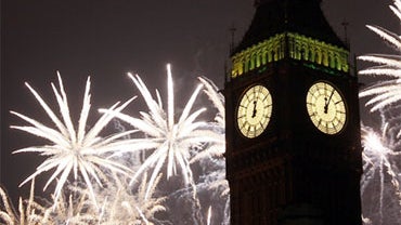 Fireworks explode over the Houses of Parliament, including St Stephen's Tower which holds the bell known as Big Ben, in central London, Saturday, Jan. 1, 2011, as Britain celebrates the start of the new year. (AP Photo/Alastair Grant) 