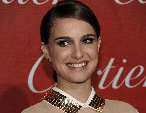 Actress Natalie Portman arrives at the 2011 Palm Springs International Film Festival Awards Gala in Palm Springs, Calif. on Saturday, Jan. 8, 2011. (AP Photo/Dan Steinberg) 