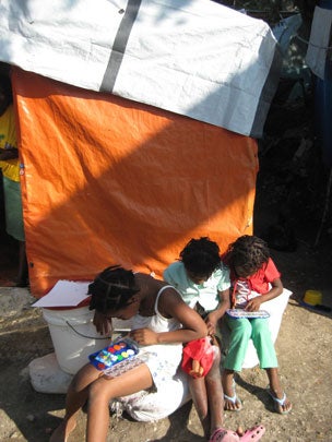 girls-at-play-in-tent-city.jpg 