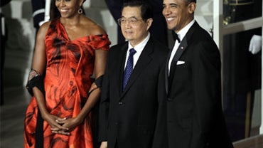 President Obama and first lady Michelle Obama welcome China's President Hu Jintao to the North Portico of the White House in Washington, Wednesday, Jan. 19, 2011, for the State Dinner. (AP Photo/Charles Dharapak) 