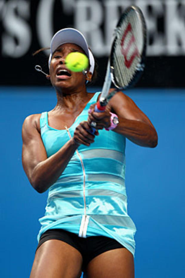 MELBOURNE, AUSTRALIA - JANUARY 17: Venus Williams of the United States of America plays a backhand in her first round match against Sara Errani of Italy during day one of the 2011 Australian Open at Melbourne Park on January 17, 2011 in Melbourne, Austral 