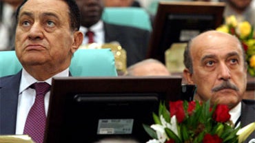 A December 2005 file photo shows Omar Suleiman (right), with Egyptian President Hosni Mubarak at a conference in Mecca. Egypt's intelligence chief was named by Mubarak to be his vice president on Jan. 28, 2011. 