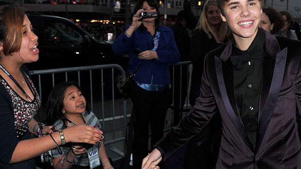 Justin Bieber arrives 'at the premiere of 'Justin Bieber: Never Say Never' on February 8, 2011 in Los Angeles.  
