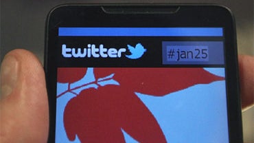 In this photo illustration a smartphone displays a page from Twitter on January 27, 2011 in Cairo, Egypt. 