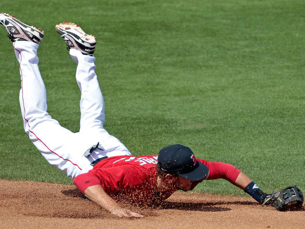Red Sox shortstop Jed Lowrie makes a diving catch  