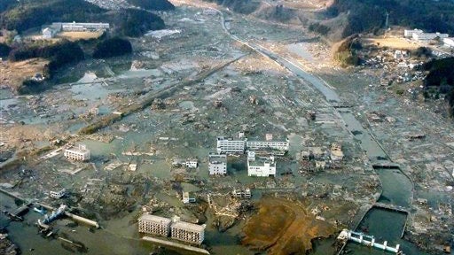 Quake, tsunami slam Japan 