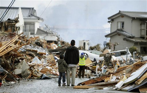 Quake, tsunami slam Japan