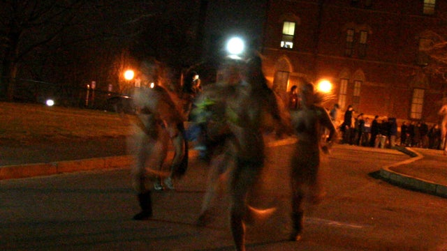 Students at Tufts University protesting the end of the Naked Quad Run with a...naked quad run. 