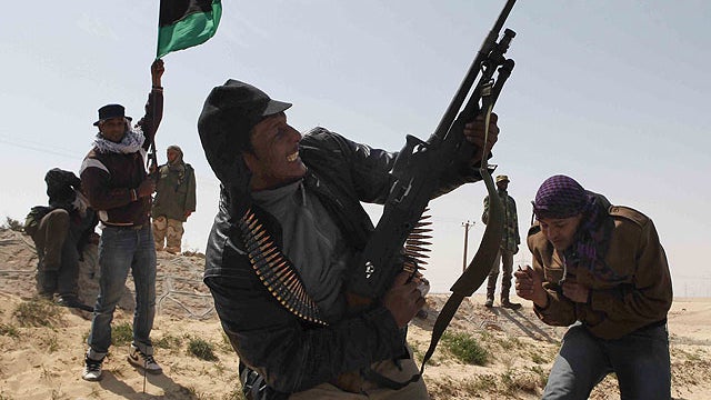 Libyan rebels celebrate in the city of Ajdabiya, south of Benghazi, eastern Libya, March 26, 2011.  