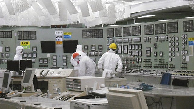 In this photo released by Tokyo Electric Power Co. via Kyodo News, lighting becomes available on March 26, 2011 in the control room of Unit 2 reactor at the stricken Fukushima Dai-ichi nuclear power plant in Okumamachi, Fukushima prefecture, Japan.  