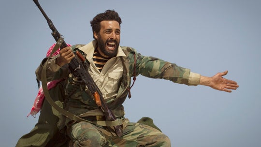 A Libyan rebel urges people to leave 