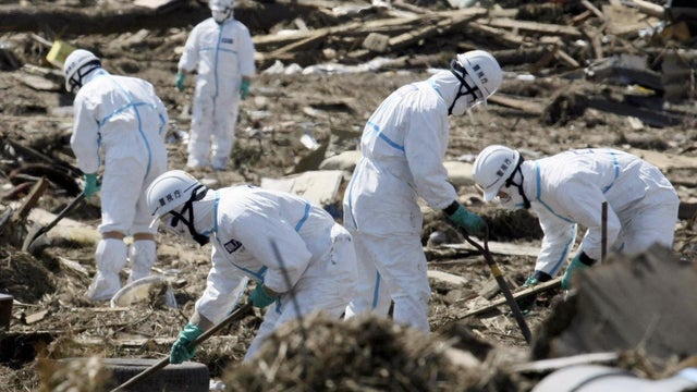 Police search for bodies in Japan 