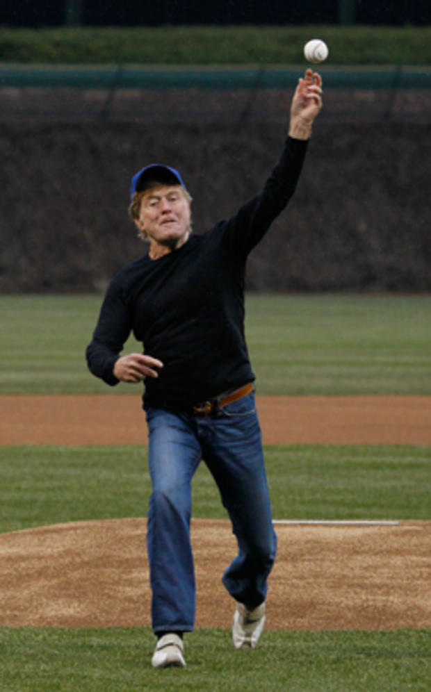 obert Redford throws out a ceremonial first pitch before the opening day baseball game between the Chicago Cubs and the Pittsburgh Pirates 
