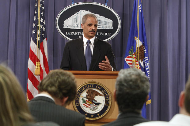 Attorney General Eric Holder gestures during a news conference at the Justice Department in Washington, Monday, April 4, 2011 