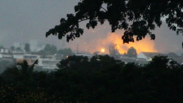 Fire rises from Akouedo military camp in Abidjan after NATO helicopter strike 