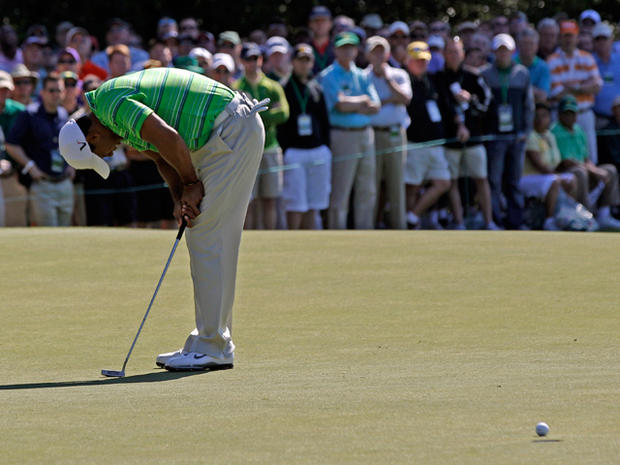 Tiger Woods reacts after missing a putt 