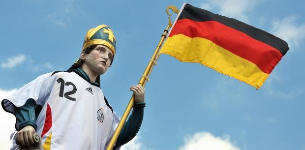 a-german-flag-sticks-on-a-statue-of-st.jpg 