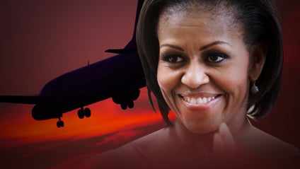 A White House plane carrying Michelle Obama came dangerously close to a 200-ton military cargo jet and had to abort its landing at Andrews Air Force Base on Monday as the result of an air traffic controller&acirc;??s mistake, according to federal officials fami 