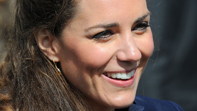 Kate Middleton smiles after a visit to Witton Country Park with Prince William in Darwen, Lancashire, England, April 11, 2011. 