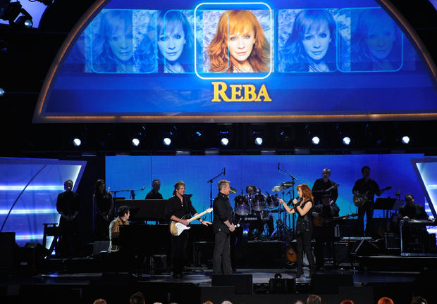 musicians-jay-demarcus-joe-don-rooney-and-gary-levox-of-the-band-rascal-flatts-and-reba-mcentire-perform-onstage.jpg 