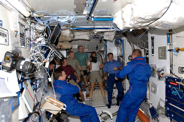 After Endeavour docked with the ISS, the Expedition 18 crew welcomes the STS-126 astronauts aboard the orbiting space station.  