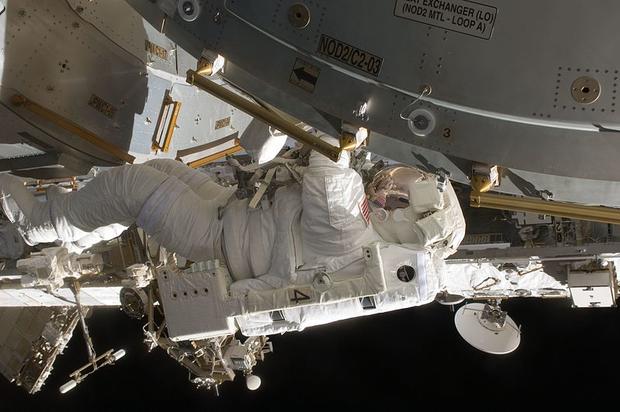 During the first of five spacewalks to be performed on the International Space Station by the STS-127 crew, Tim Kopra grips the handrail on Harmony or U.S. Node 2 on July 19, 2009. When the Endeavour crew returns to Earth, Kopra stayed onboard the station 