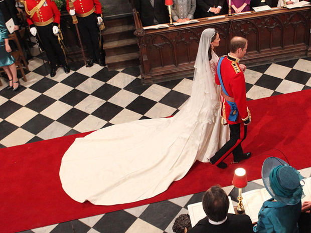 Prince William and his new bride Catherine Middleton walk down the aisle 