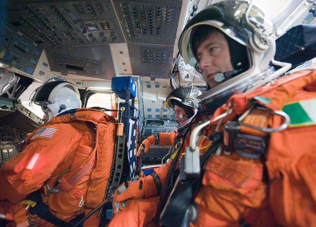 Pilot Gregory Johnson, astronaut Michael Fincke, European Space Agency astronaut Roberto Vittori 