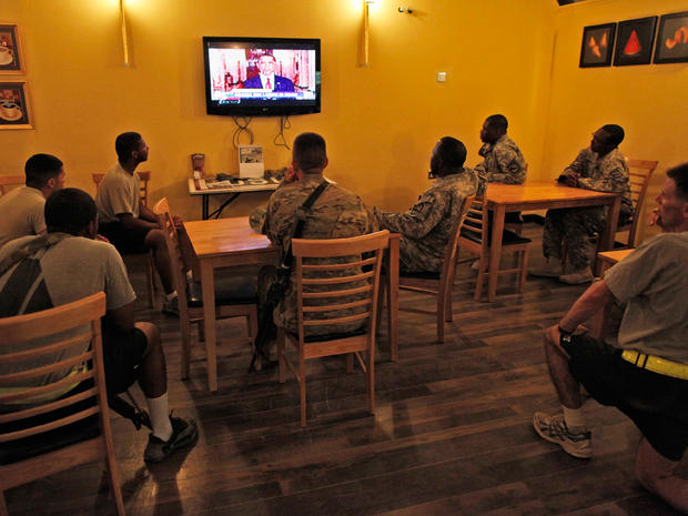U.S. military troops in Afghanistan watch the announcement by President Obama that Osama bin Laden had been killed. 