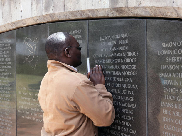 Douglas Sidialo, who lost his sight in the 1998 bombing of the U.S. embassy in Nairobi pray at the memorial remembering the victims in Nairobi, Kenya, Monday, May 2. 2011. 