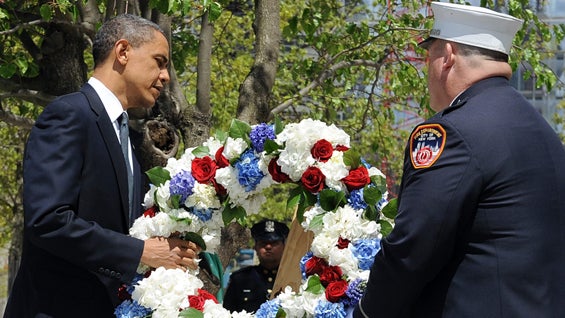 	US President Barack Obama lays a wreath at the 9/11 Memorial in New York on May 5, 2011. Obama was Thursday braced for a 'bittersweet' visit to Ground Zero after the killing of Osama bin Laden, but felt it was important to go to offer 'closure' to Americ 